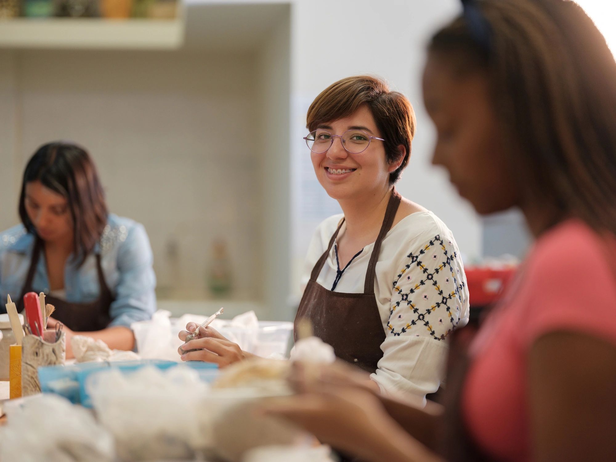 Smiling student in a creative class