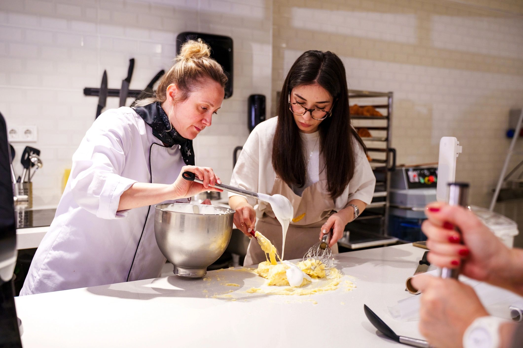 Hands-on baking instruction in a classroom kitchen