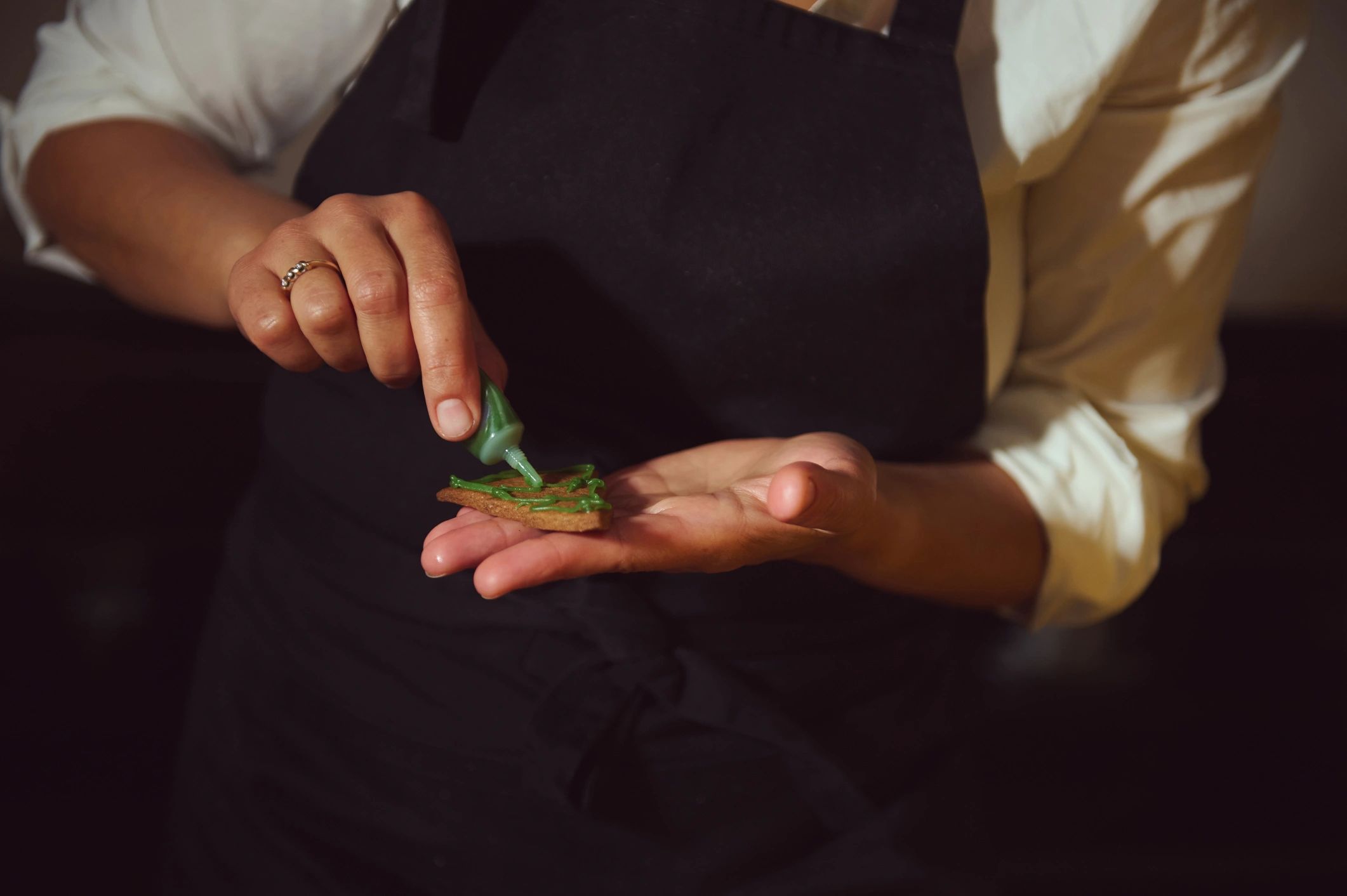Close-up of cake decorating with icing