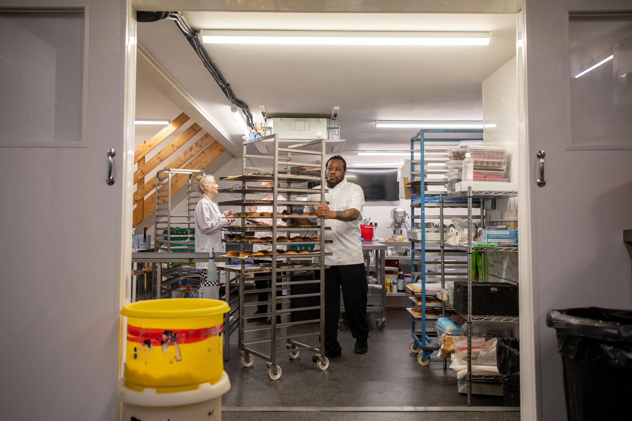 Baking school classroom with chefs in a professional kitchen